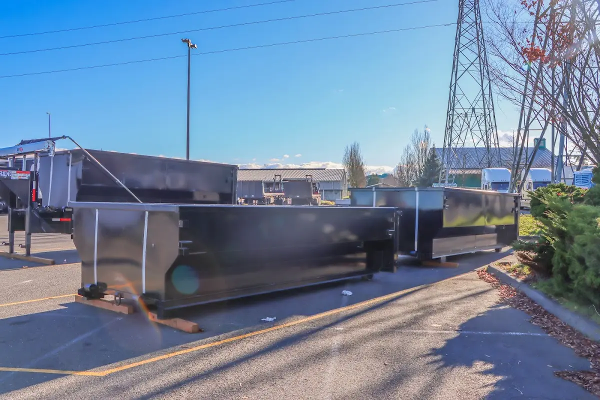 Roll-off dumpster ready for waste disposal at job site for 20 Yard Dumpster Rental in Marshfield